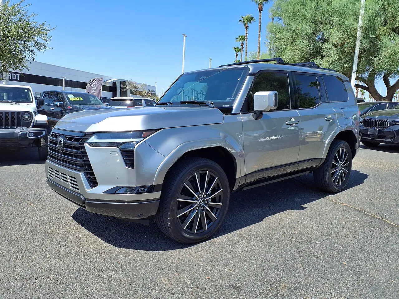 Silver Lexus GX 550 three-row luxury SUV parked outdoors, a popular choice with Valley families